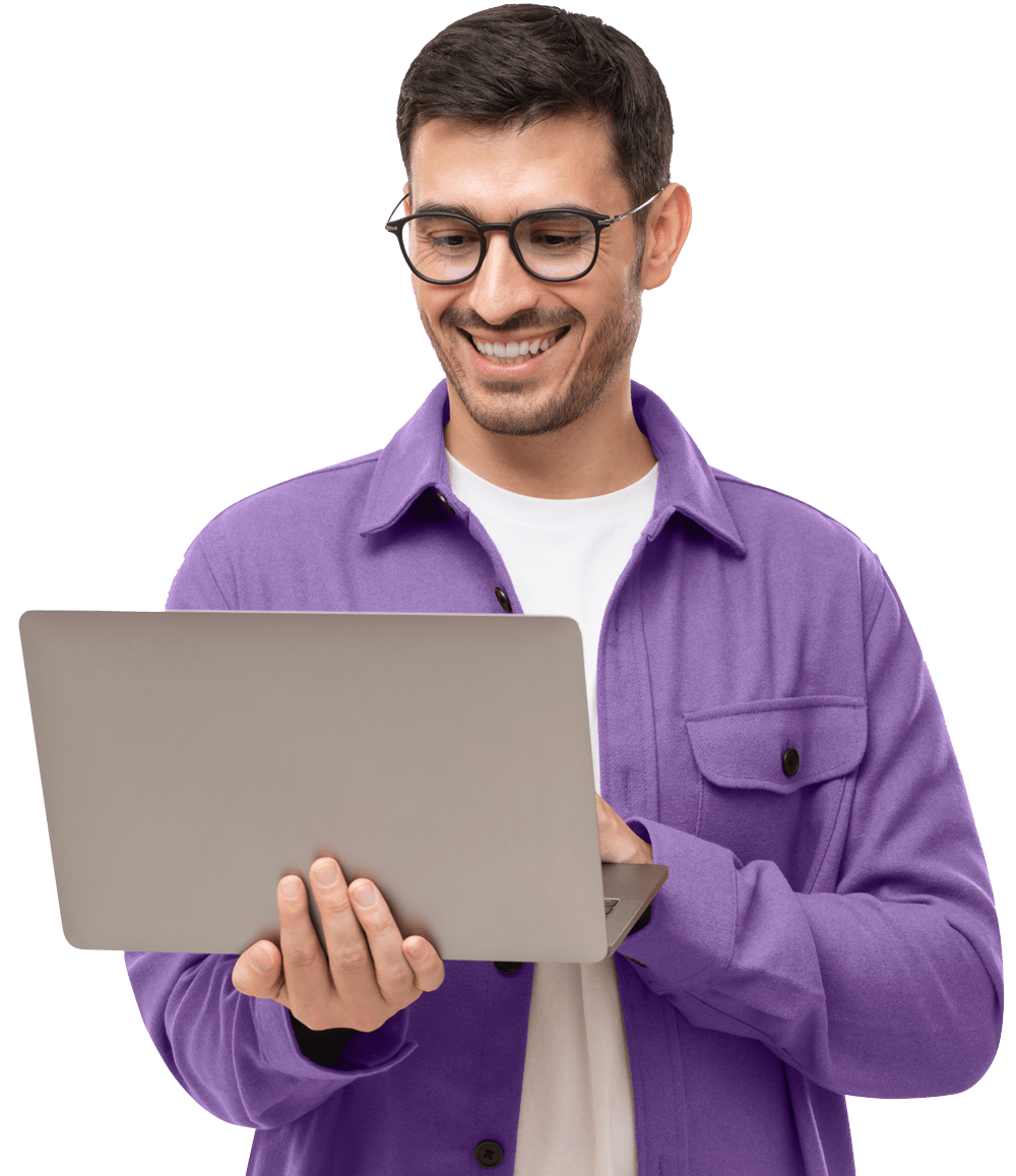 happy man standing with opened laptop browsing onl WJVQED8